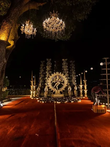 A divine welcome setup featuring a stunning Nataraja sculpture for a Sangeet night in Udaipur. I incorporate powerful cultural symbols into the decor to add meaning and grandeur to the celebration.