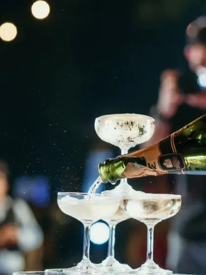 Nothing says celebration like a champagne tower. We can create this classic, show-stopping centerpiece for your wedding or special event, ensuring a memorable toast.