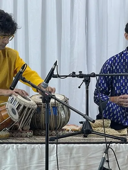 On stage with Sounak da in the US. The chemistry between the main artist and the accompanist is crucial for a successful performance.