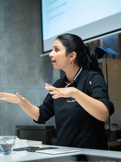 An instructor passionately explaining the nuances of chocolate making during the Bean to Bar masterclass.