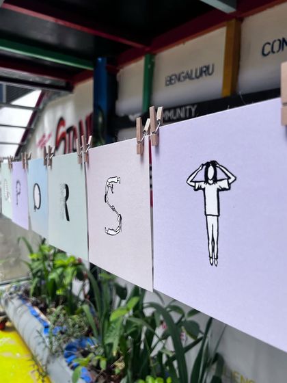 The 'Mental Health Alphabet' is a series I started during the pandemic to spark conversations around mental wellbeing. Each letter illustrates a condition or feeling related to mental health. Displaying them on a clothesline alludes to the idea that these states are not permanent parts of our identity.
