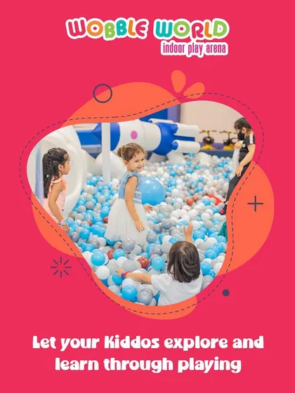 Kids exploring and learning through play in our ball pit. It's a dynamic environment that encourages curiosity and social interaction.
