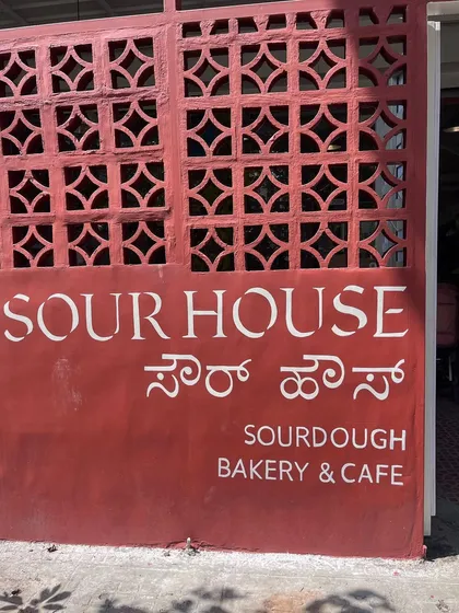 Typographic wall art is key for branding. This hand-painted sign for a sourdough bakery adds an organic, authentic touch to their entrance.