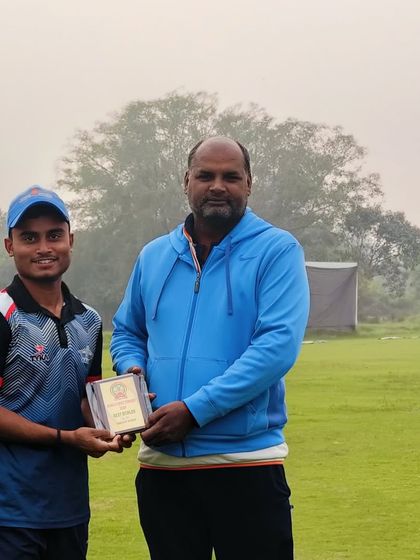 Karan Mishra with his Man of the Match award from the first match of the tournament.