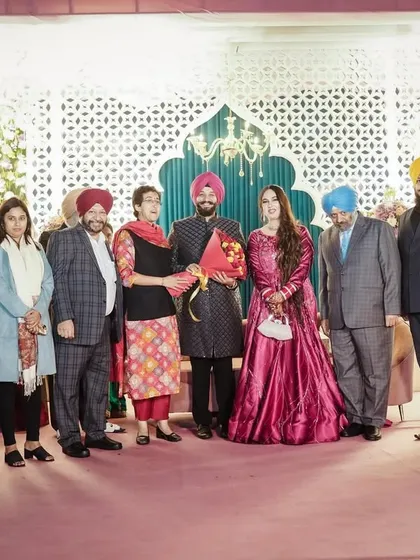Another group portrait with political figures and guests at a high-profile wedding.