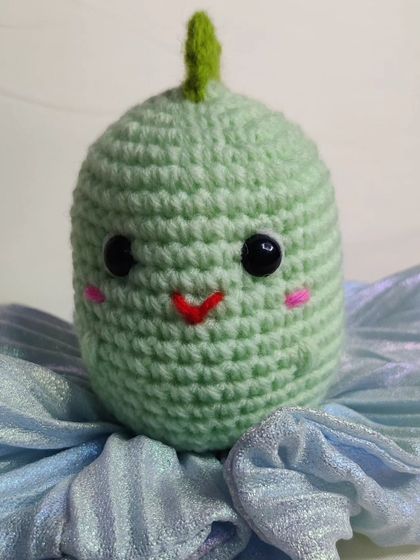 My tiny dino keychains are a handful of cuteness. They come in four different colors: blue, yellow, green, and grey.