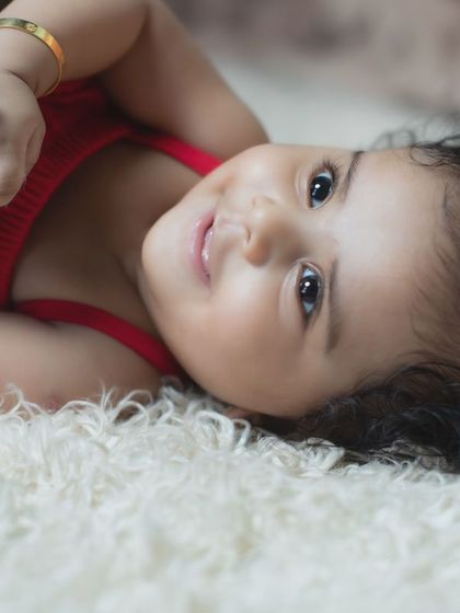 A perfect portrait of a happy and relaxed baby.