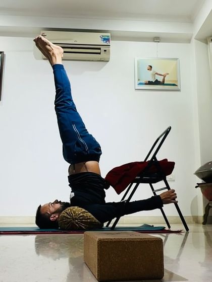 I demonstrate a supported Sarvangasana (Shoulderstand) using a chair. This prop-based approach, inspired by B.K.S. Iyengar, makes inversions accessible and allows you to hold the pose longer to receive its full benefits.