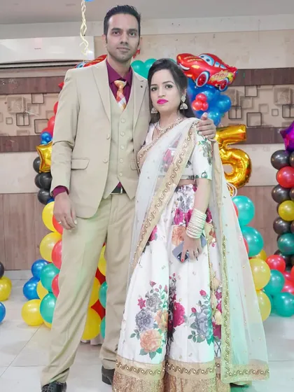 A couple dressed in elegant attire for a 50th-anniversary celebration. I cover milestone events for adults as well as children.