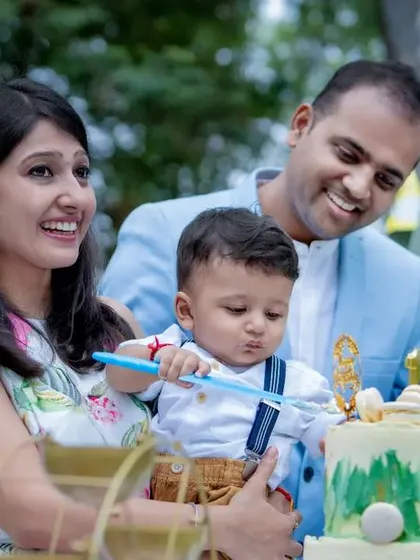 Pure joy celebrating a first birthday! We capture the fun and excitement of milestone events, from the beautiful cake to the baby's curious expressions.