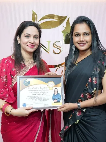 A proud moment with a student who has completed her Salon Cosmetology Diploma. She is now ready to take on advanced skin aesthetic treatments.