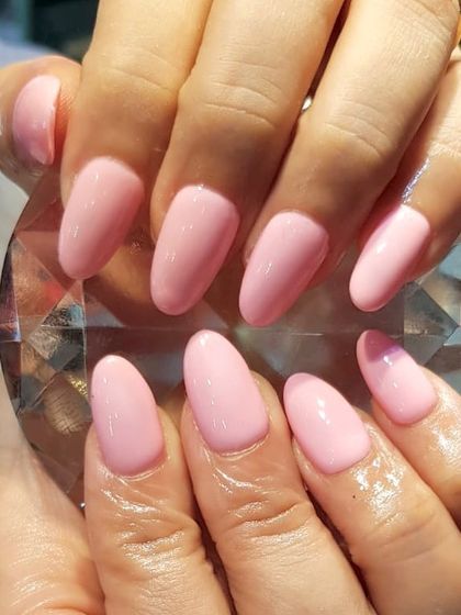 Baby pink nails can never go wrong. This is a beautiful set of Gel-X extensions with a classic, soft pink polish for an elegant and feminine look.