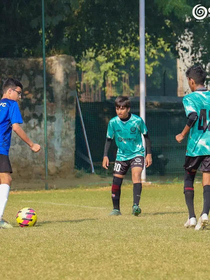Players from GSC and KOTA FC position themselves strategically during a break in play.