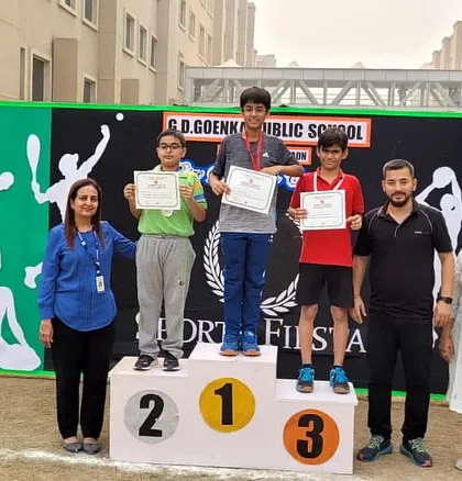 On the podium at the GD Goenka School's Sport Fiesta. Our player Laksh Malik stands tall at the number one spot after winning the Under 12 table tennis competition.