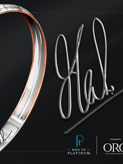 The signature detail. A close-up of the 'Mahi' signature, which is a key feature of this exclusive Men of Platinum collection.