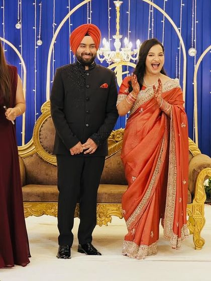 Sharing a laugh with this lovely couple on stage. My job is to make them feel comfortable, happy, and celebrated.