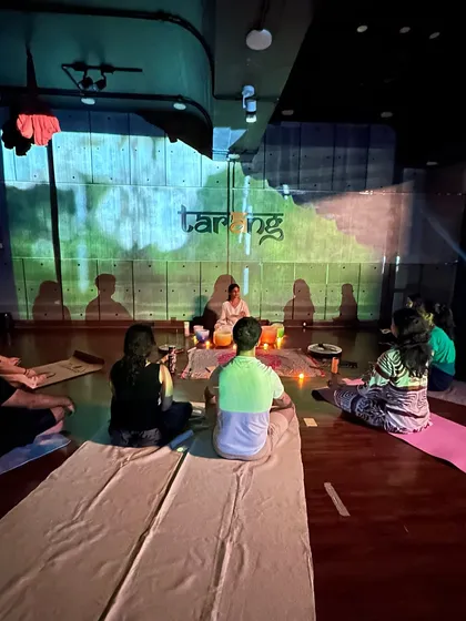 A view from the back of the studio shows how everyone settles into their own space. We keep the groups small to ensure a personal and powerful experience for everyone attending the wellness session.