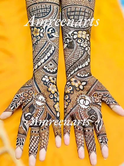 A swirling, intricate design for an engagement, featuring peacocks and intertwined rings.
