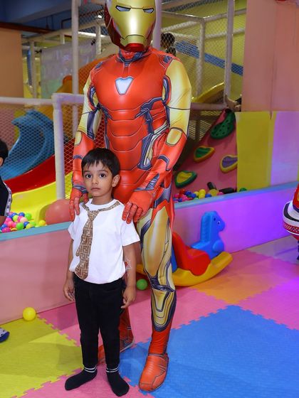 A young guest gets to meet the invincible Iron Man. Our high-quality costumes make the characters look like they've stepped right out of a movie.