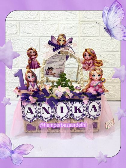 A personalized hamper for Anika's first birthday, following a lovely Rapunzel and butterfly theme.