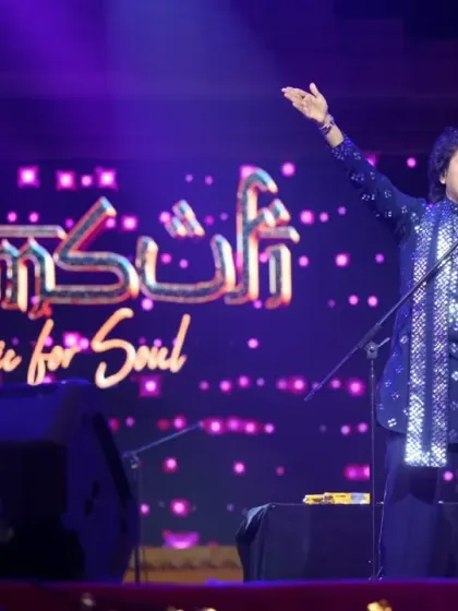 Our lead vocalist against the backdrop of our name, "Music for Soul." A signature shot from our performance at the Balijatra Festival in Cuttack.