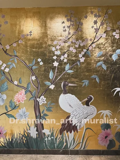 To create a truly luxurious ambience, I often use premium materials like gold lustre. This mural, inspired by classic Chinese art, features hand-painted cranes and cherry blossoms on a shimmering gold background, completely transforming the wall into a work of art.