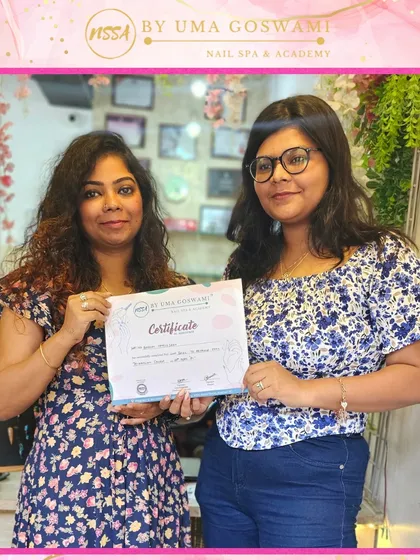Darshana with her certificate, a symbol of her hard work and the skills she has mastered at our academy.