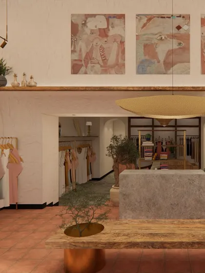 Another render of the Eka store, showing the interplay of light, art, and natural materials. The design features a live-edge wood table, a monolithic stone counter, and terracotta flooring to create a warm, earthy, and poetic space.