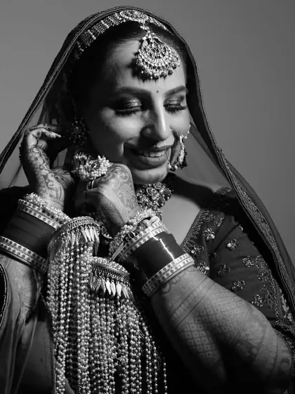 A timeless black and white shot that captures the emotion and beauty of the bride on her wedding day.