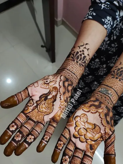 The completed design, featuring a portrait of the mother on one hand and a baby on the other. The arms are adorned with a modern lotus pattern.