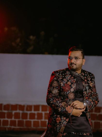 This moody shot captures the sophisticated vibe of the black floral Indo-Western outfit. It’s the perfect choice for an evening event where you want to project confidence and style.