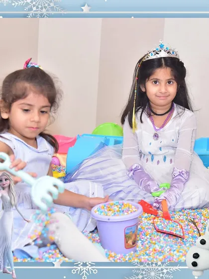 Our Frozen-themed parties are always a hit. Here, two little princesses enjoy playing in our colorful sensory bead pit, fully immersed in their magical world.