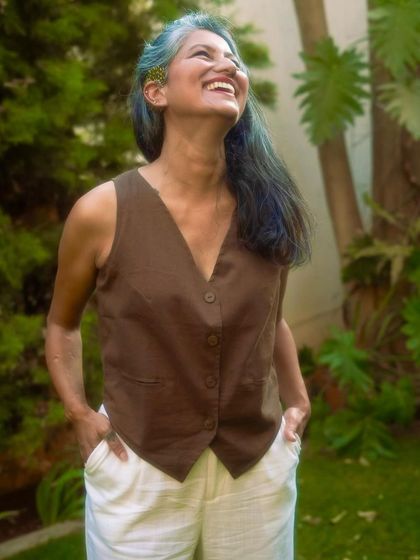 Another shot of the breezy and chic handloom waistcoat, a testament to supporting local, sustainable fashion.