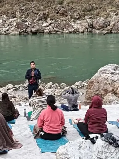 I lead a class on the banks of the Ganga. Teaching in nature is a core part of our philosophy, connecting the ancient wisdom of yoga with the living world around us.
