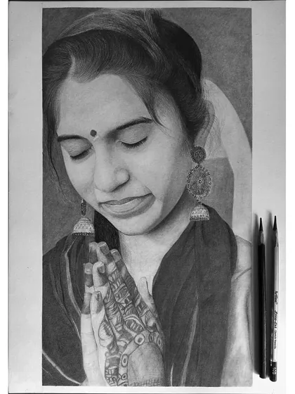 Sometimes even I’m surprised by the finished piece. This was a paid commission where the challenge was to render the delicate mehndi design on her hands with just a pencil.