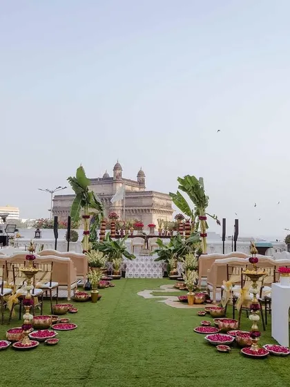 The full view of the wedding aisle for Vijayshree and Omkar, leading to the mandap with the Gateway of India in the background. The entire setup was designed to feel grand yet deeply rooted in tradition.