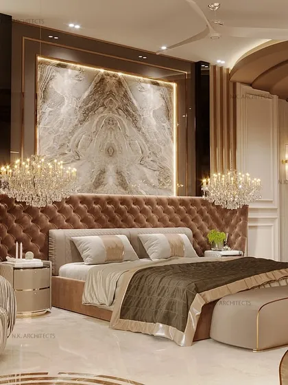 This space is a seamless blend of neo-classical and contemporary design. We used a statement marble wall, a tufted headboard, and a curved ceiling to create an inviting yet luxurious ambiance.