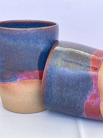 Two Celestial Dunes mugs, showing how the glaze pattern differs slightly between each piece, making them a unique pair.