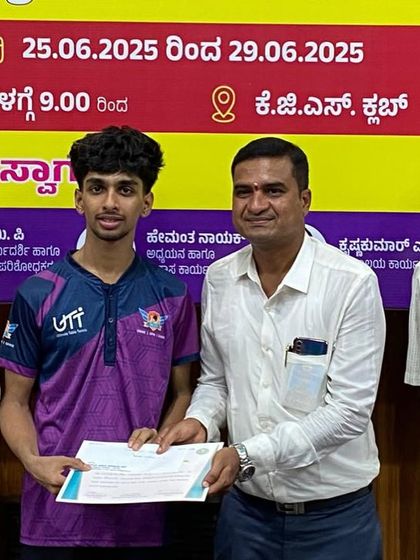 One of our players receiving his certificate at the 2nd State Ranking Tournament, where our academy secured numerous podium finishes.