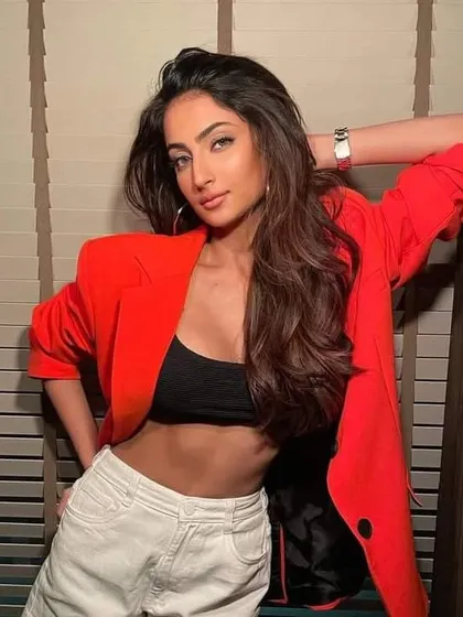 Palak Tiwari showcasing the relaxed yet powerful vibe of her styled outfit. This look is a great example of versatile celebrity styling for daytime events or appearances.