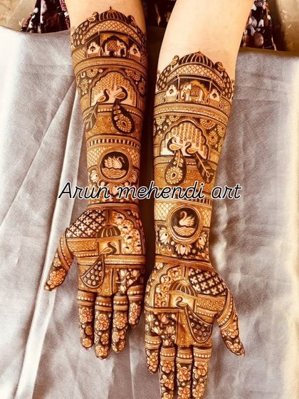 This design is filled with a variety of auspicious symbols, including elephants, peacocks, swans, and a doli.