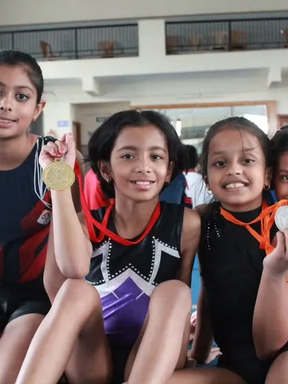 A group of our happy medalists at the Dasara District Level selection. Their smiles are a testament to their success.