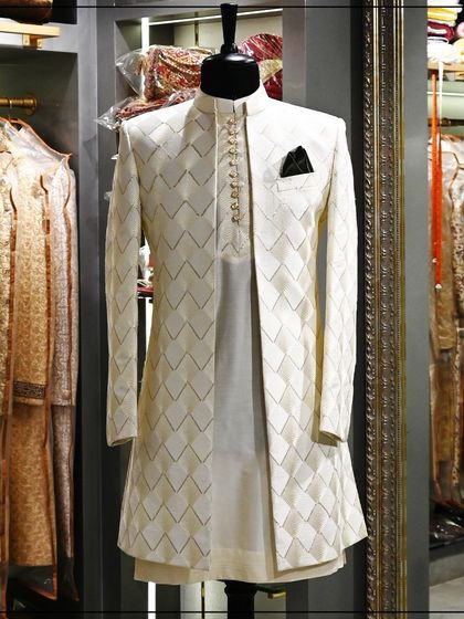 Another view of the elegant off-white Indo-Western sherwani with a geometric pattern, highlighting its sophisticated and modern appeal.