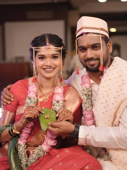 A happy couple portrait. The bride and groom are all smiles during their wedding ceremony, a beautiful moment captured forever.
