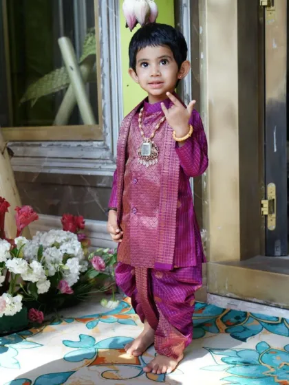 Here is another look at this charming dhoti-kurta ensemble, showcasing the soft silk fabric and detailed craftsmanship. My focus is on creating children's festive wear that is both authentic and easy to wear, so they can enjoy the occasion without any fuss.