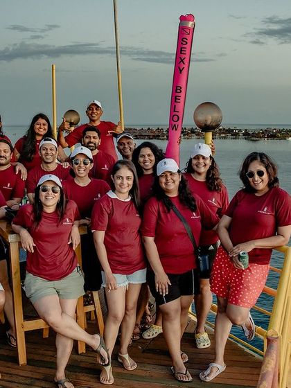The Sipadan 2024 crew on the Seaventures rig. The sign says "Sexy Below" and after the dives we had, I'd have to agree.