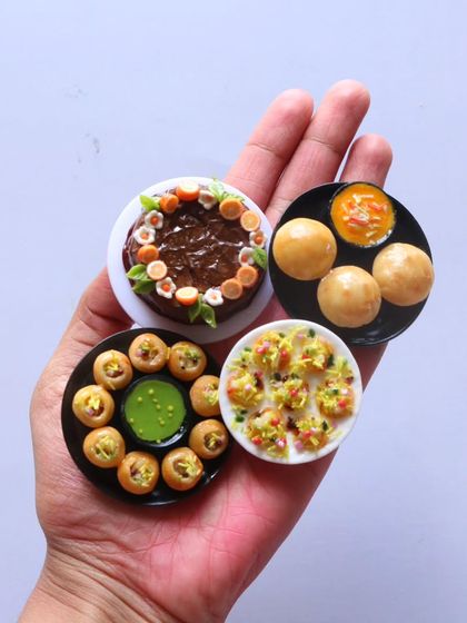 A handful of my favorite miniatures, including pani puri, chole bhature, and a chocolate cake.