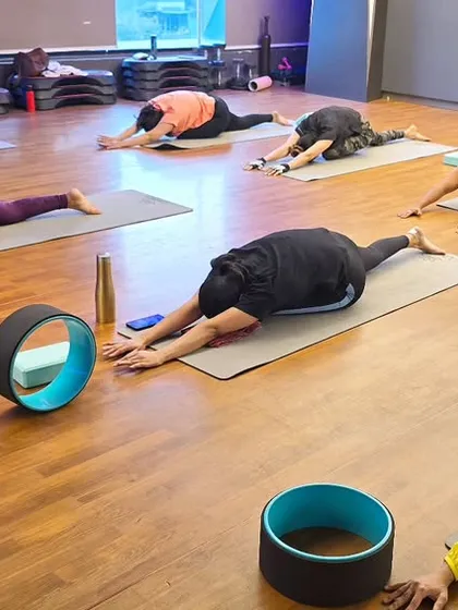This deep stretch in the lower body, a variation of a hip opener, improves flexibility in the hip flexors, glutes, and hamstrings, which can help relieve back pain.