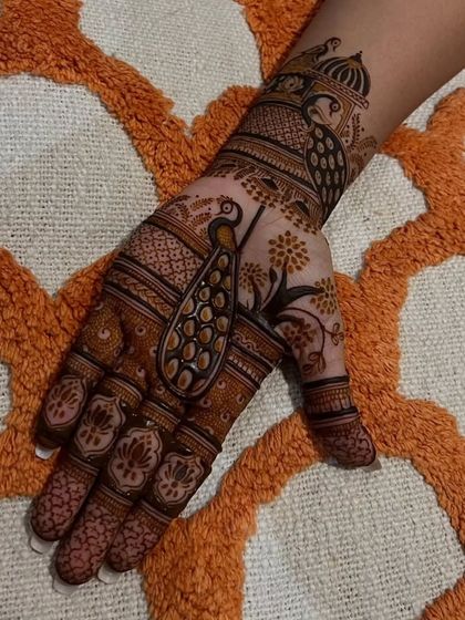 A clear shot of the peacock trial design, highlighting the fine shading and line work that bring the motif to life.