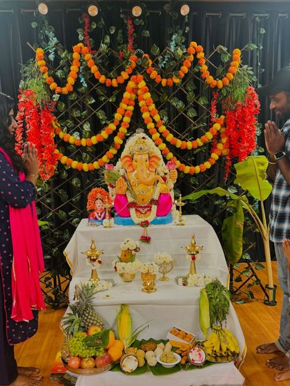 A moment of prayer and devotion with my family during the festival at the studio. We believe in blessings for our space and our members.
